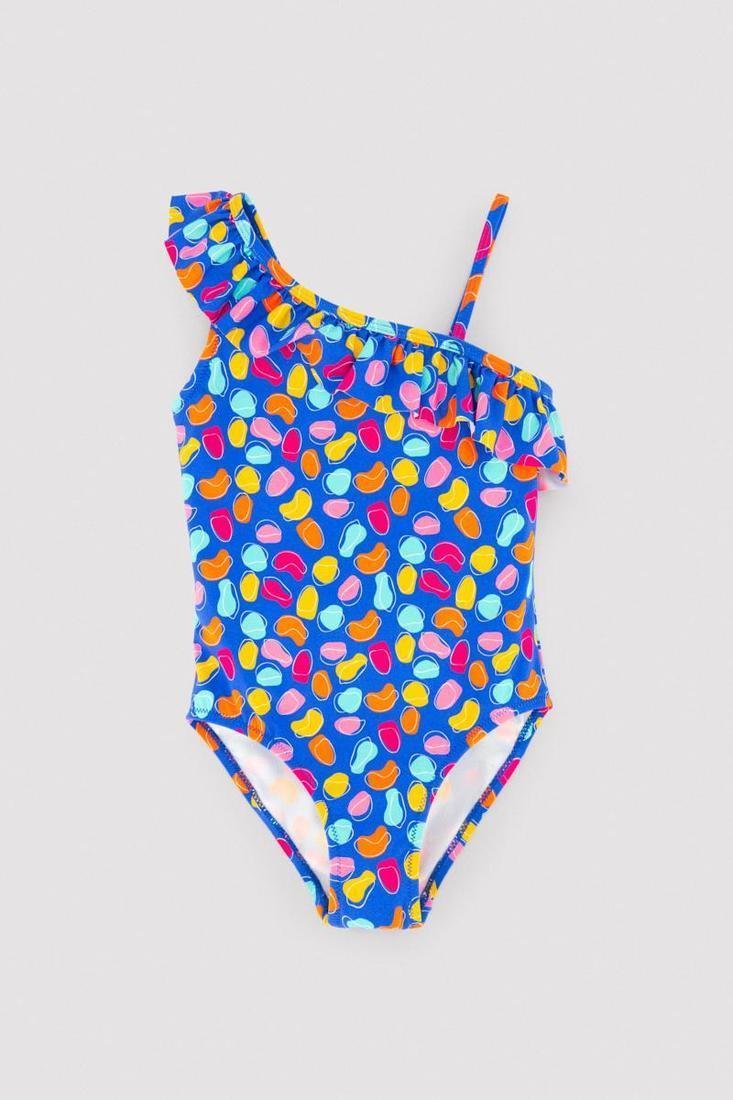 Costume da bagno bimba YSABEL MORA asimmetrico con stampa multicolore a forma organica. Presenta un volant obliquo che va dalla spalla alla schiena.